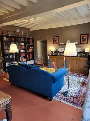 Coin salon dans l'établissement Le gîte de Montjardin du Château de Vaulx