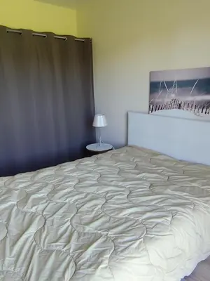 Un ou plusieurs lits dans un hébergement de l'établissement Appartement La pierre de bresse