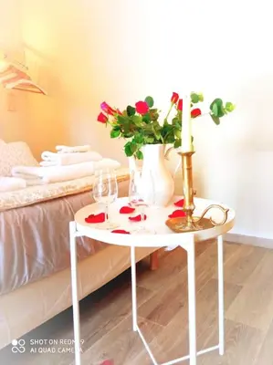 Un ou plusieurs lits dans un hébergement de l'établissement L'atelier des rêves Un moment magique spa privé
