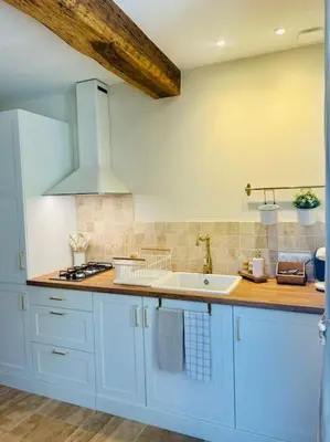 Cuisine ou kitchenette dans l'établissement Le Cocon