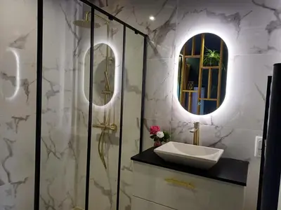 Salle de bains dans l'établissement Bélénos - Suites & Spa