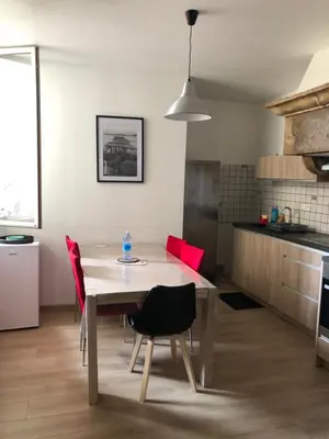 Cuisine ou kitchenette dans l'établissement Au passage