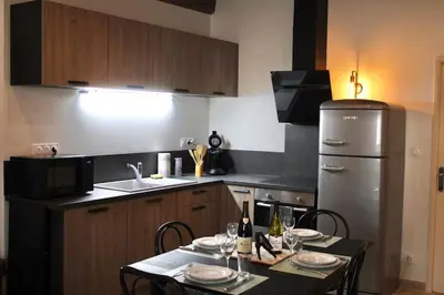 Cuisine ou kitchenette dans l'établissement Le relais