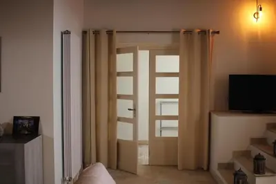 Télévision ou salle de divertissement dans l'établissement Le relais