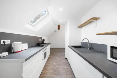 Cuisine ou kitchenette dans l'établissement Le Duplex Moutarde, prox centre et Gare, 50m2, climatisation