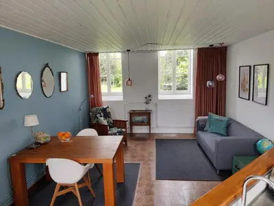 Coin salon dans l'établissement Le Puits du Bonheur