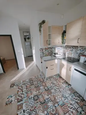 Cuisine ou kitchenette dans l'établissement Maisonnette - Charme Cœur de Vigne