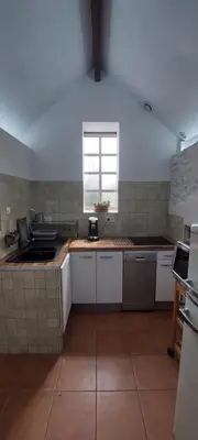 Cuisine ou kitchenette dans l'établissement Gîte La Chaume