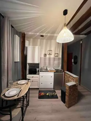 Coin salon dans l'établissement Studio cosy, cité gastronomique