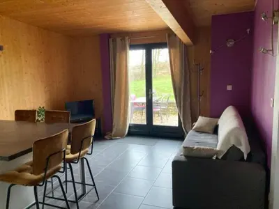Coin salon dans l'établissement Lodge détente et spa
