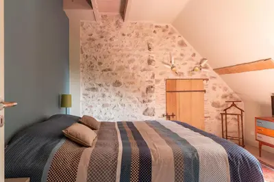 Un ou plusieurs lits dans un hébergement de l'établissement Le Theureau B&B