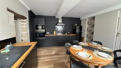 Cuisine ou kitchenette dans l'établissement Gîte 