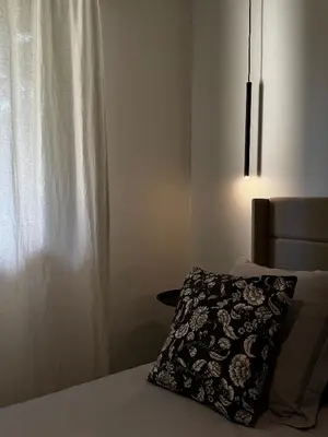 Un ou plusieurs lits dans un hébergement de l'établissement Appartement moderne