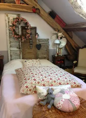 Un ou plusieurs lits dans un hébergement de l'établissement La petite maison dans la campagne