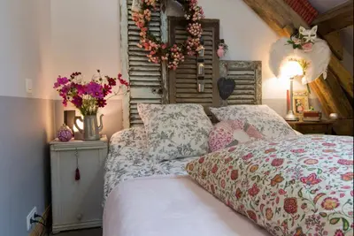 Un ou plusieurs lits dans un hébergement de l'établissement La petite maison dans la campagne