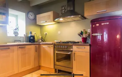 Cuisine ou kitchenette dans l'établissement La petite maison dans la campagne