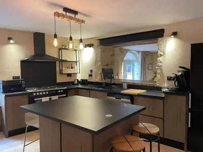 Cuisine ou kitchenette dans l'établissement Maison Perrières