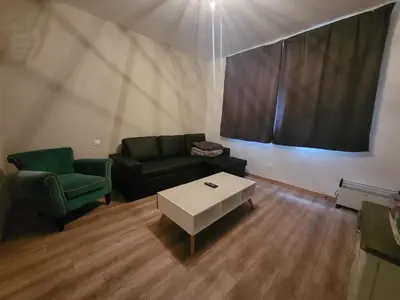 Coin salon dans l'établissement Gite Le Creusot - 4 Chambres individuelles