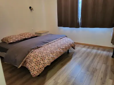 Un ou plusieurs lits dans un hébergement de l'établissement Gite Le Creusot - 4 Chambres individuelles