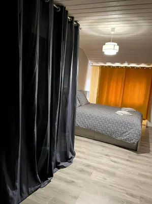 Un ou plusieurs lits dans un hébergement de l'établissement Maison au coeur du village