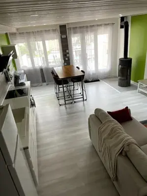 Coin salon dans l'établissement Maison au coeur du village