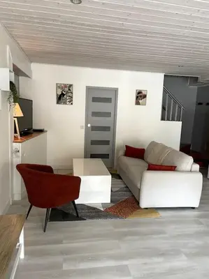 Coin salon dans l'établissement Maison au coeur du village