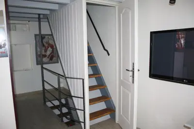 Télévision ou salle de divertissement dans l'établissement Doubs séjour Studio4