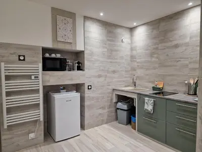 Cuisine ou kitchenette dans l'établissement Votre gîte au Domaine du Lynx