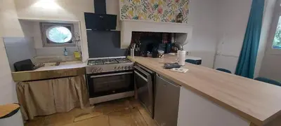 Cuisine ou kitchenette dans l'établissement A la Ferme du Trembloy