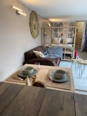Coin salon dans l'établissement Petite maison cosy Chez Georges