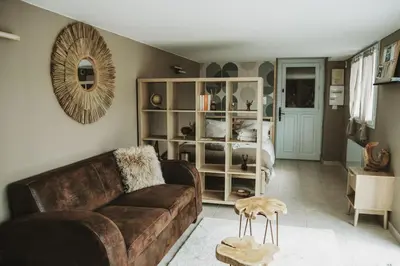 Coin salon dans l'établissement Petite maison cosy Chez Georges
