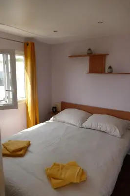 Un ou plusieurs lits dans un hébergement de l'établissement La lodge de l'étoile du berger