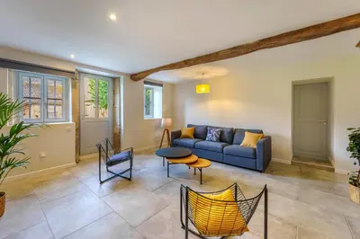 Coin salon dans l'établissement Maison de vacances