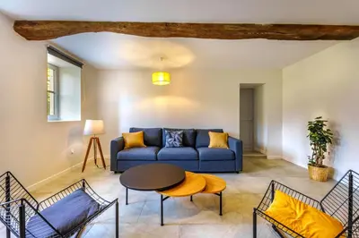 Coin salon dans l'établissement Maison de vacances