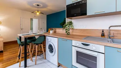 Cuisine ou kitchenette dans l'établissement Le Chouette Toucan