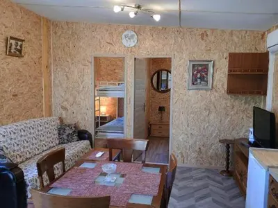 Télévision ou salle de divertissement dans l'établissement Gîte Bleu Confort et Nature