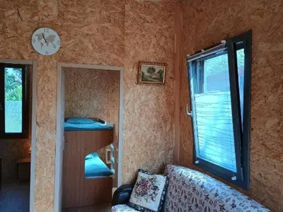Un ou plusieurs lits dans un hébergement de l'établissement Gîte Bleu Confort et Nature