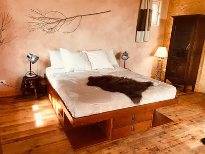 Un ou plusieurs lits dans un hébergement de l'établissement CHALET DES CHEVREUILS -les chalets de Montsermage