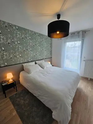 Un ou plusieurs lits dans un hébergement de l'établissement Hippolyte - Magnifique appartement en centre-ville