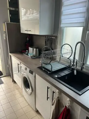 Cuisine ou kitchenette dans l'établissement Escale du parc