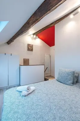 Un ou plusieurs lits dans un hébergement de l'établissement Strike & Chill - Duplex - Au Cœur de Dijon
