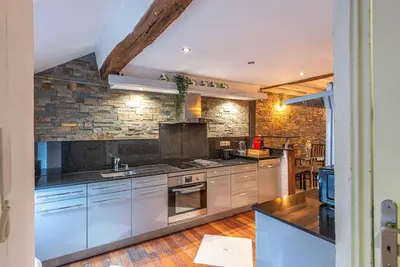 Cuisine ou kitchenette dans l'établissement Strike & Chill - Duplex - Au Cœur de Dijon
