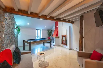 Coin salon dans l'établissement Strike & Chill - Duplex - Au Cœur de Dijon