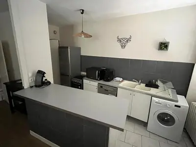 Cuisine ou kitchenette dans l'établissement Appartement centre ville Charolles