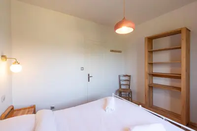 Un ou plusieurs lits dans un hébergement de l'établissement Cabana & Maison sur les hauteurs - Proche Cluny