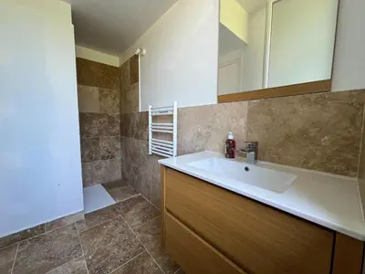Salle de bains dans l'établissement Ushuaïa Villages-Domaine de Scott