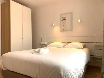 Un ou plusieurs lits dans un hébergement de l'établissement Appart'Village Le Creusot centre - Parking facile - Bus gare TGV 17 min