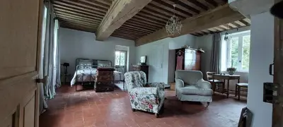 Coin salon dans l'établissement Domaine de Vauvelle