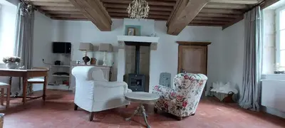 Coin salon dans l'établissement Domaine de Vauvelle