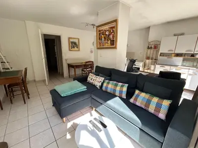Coin salon dans l'établissement Eden un jardin au cœur du village